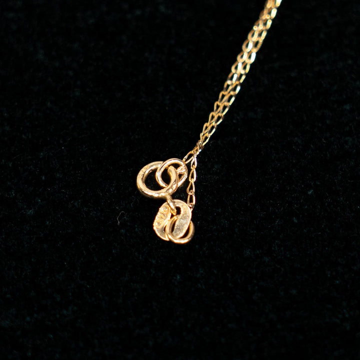 可憐な花が連なる トリプルクラスター ダイヤモンド エメラルド ペンダント /23K