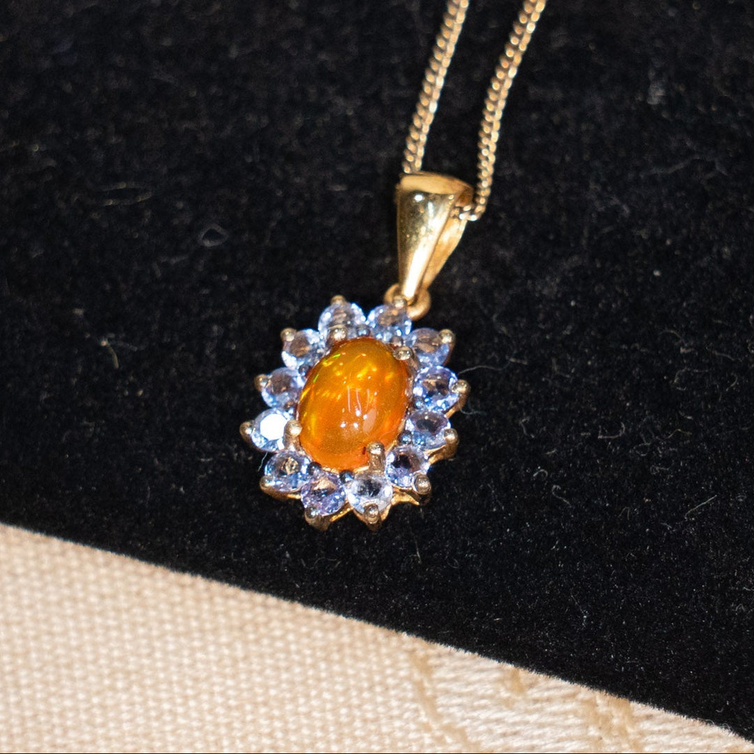 鮮やかなオレンジオパールを神秘的なタンザナイトが囲う ペンダント /25G