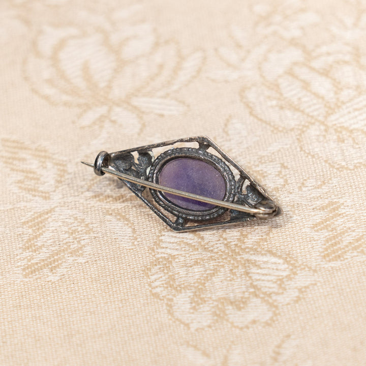 菱形の洗練されたフレームに深紫色の石がエレガント アンティークブローチ /25G